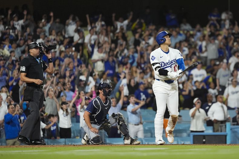 El japonés Shohei Ohtani, bateador designado de los Dodgers de Los Ángeles, conecta un grand slam para resolver el encuentro del viernes 23 de agosto de 2024 ante los Rays de Tampa Bay (AP Foto/Ashley Landis)