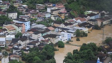 americateve | Vista a&eacute;rea de la municipalidad de Santa Leopoldina, inundada luego de lluvias torrenciales, en el estado de Espirito Santo, en Brasil, el mi&eacute;rcoles 25 de diciembre de 2013.  La cifra de muertos por las inundaciones y deslaves a causa de las