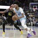 Grizzlies arrollan a Warriors y evitan eliminación