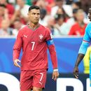 El portugués Cristiano Ronaldo (izquierda) y el congolés Axel Tuanzebe durante el partido por el Grupo K del Mundial, el miércoles 17 de junio de 2026, en Houston. (AP Foto/Karen Warren)