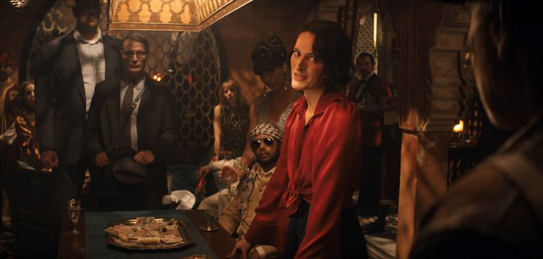 En esta imagen proporcionada por Lucasfilm, Mads Mikkelsen, izquierda, y Phoebe Waller-Bridge en una escena de Indiana Jones and the Dial of Destiny. (Lucasfilm Ltd. vía AP)