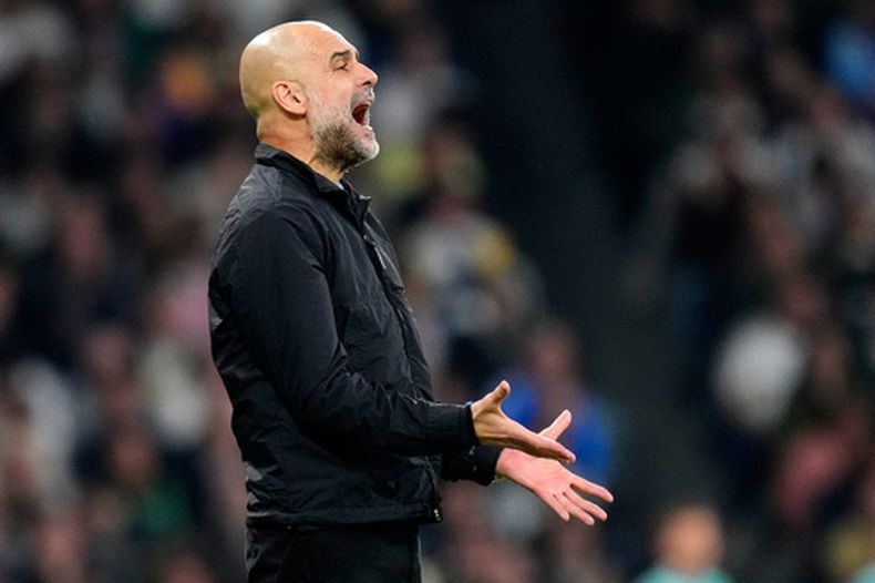 ARCHIVO - El técnico Pep Guardiola del Manchester City durante el partido contra el Real Madrid en los octavos de final de la Liga de Campeones, el 11 de marzo de 2026. (AP Foto/José Bretón)