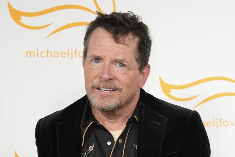 Michael J. Fox llega al evento A Country Thing Happened On The Way To Cure Parkinsons, el 26 de abril de 2023, en Nashville, Tennessee. (AP Foto/George Walker IV, Archivo)