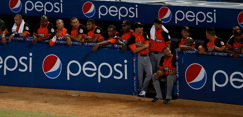 La foto del lunes 3 de febrero de 2014 muestra el dugout de Cuba, durante el juego que perdi&oacute; 5-8 ante Venezuela, el lunes 3 de febrero de 2014, en la Serie del Caribe (AP Foto/Fernando Llano)