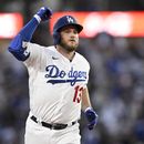 Max Muncy, de los Dodgers de Los Ángeles, festeja tras conseguir un cuadrangular en la sexta entrada del encuentro ante los Rojos de Cincinnati, el sábado 29 de julio de 2023 (AP foto/Alex Gallardo)