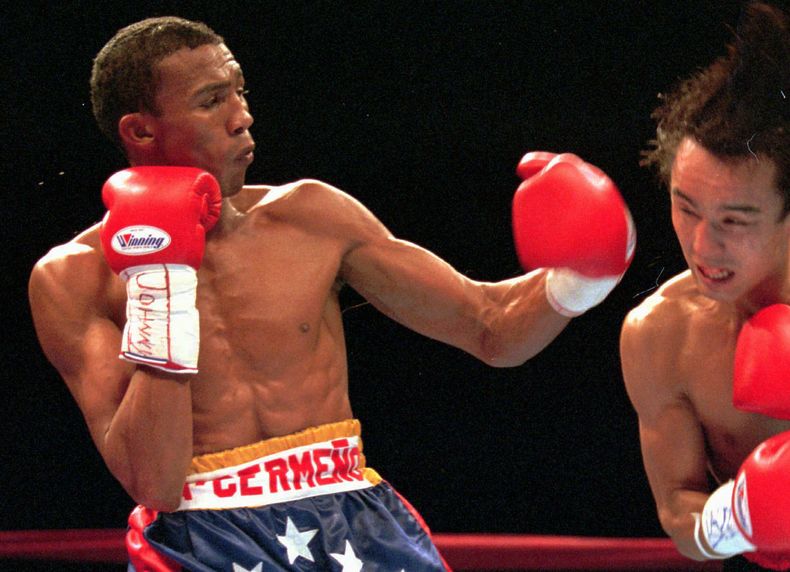 El boxeador venezolano Antonio Cerme&ntilde;o, izquierda, pelea con el japon&eacute;s Yuichi Kasai el 21 de diciembre de 1996 en Las Vegas. Cerme&ntilde;o fue secuestrado y asesinado en Venezuela, inform&oacute; la polic&iacute;a el martes, 25 de febrero
