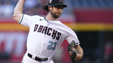 Zac Gallen, abridor de los Diamondbacks de Arizona, hace un lanzamiento en el juego ante los Rockies de Colordo, el martes 30 de mayo de 2023 (AP Foto/Ross D. Franklin)