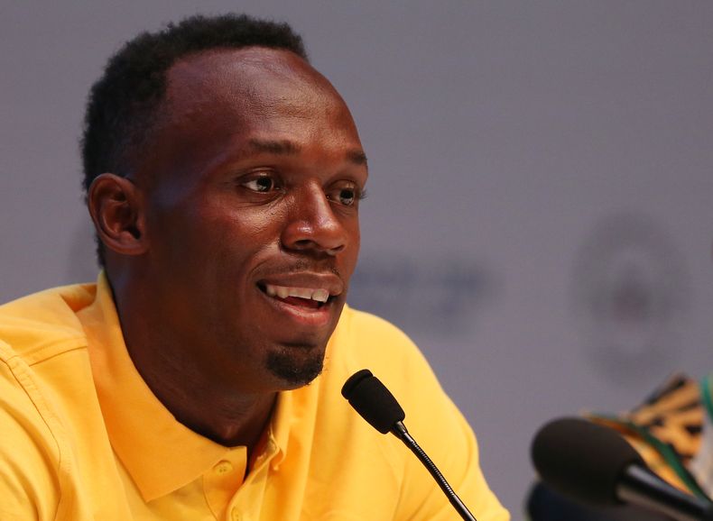 El velocista jamaiquino Usain Bolt habla en conferencia de prensa el s&aacute;bado, 26 de julio de 2014, en Glasgow, Escocia. (AP Photo/Alasatir Grant)