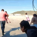 Así fue el masivo cruce de migrantes a EEUU con menores por las playas de Tijuana