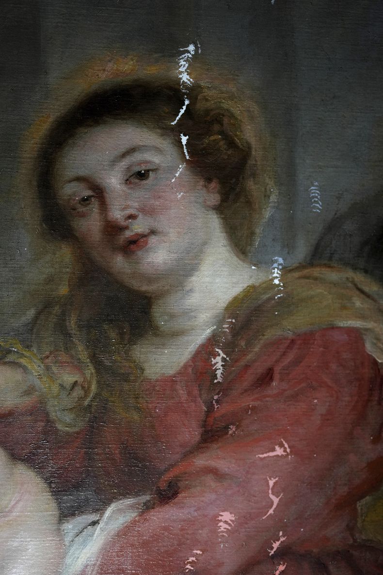Una sección de la Madona entronizada con niño, rodeada de santos, pintada por el artista flamenco Peter Paul Rubens, que muestra áreas en las que se está trabajando actualmente en el Museo Real de Bellas Artes de Amberes, Bélgica, el martes 28 de enero de 2025. (Foto AP/Virginia Mayo)