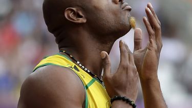 americateve | El corredor jamaiquino Asafa Powell se prepara para correr los 100 metros en los Juegos Ol&iacute;mpicos de Londres el 4 de agosto de 2012. (AP Photo/Matt Slocum, File)