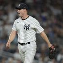 Gerritt Cole, abridor de los Yanquis de Nueva York, grita hacia el plato tras ponchar al panameño José Caballero, de los Marineros de Seattle, en el juego del martes 2o1 de junio de 2023 (AP Foto/John Minchillo)