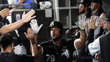 jimenez y abreu aportan jonrones a triunfo de medias blancas