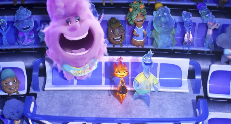 En esta imagen proporcionada por Disney/Pixar Studios los personajes Gale, centro a la izquierda, Ember, centro, y Wade, derecha, en una escena de Elemental. (Disney/Pixar vía AP)