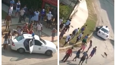 policias cubanos trasladan a joven luego de haberlo desmayado a golpes