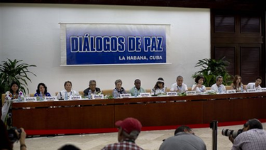 gobierno colombiano y el ejercito de liberacion nacional anunciaron un dialogo de paz