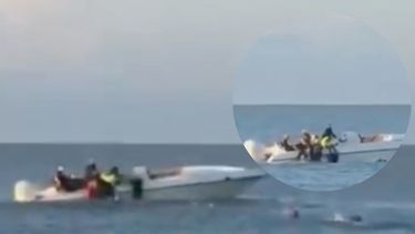 captado en camara como una lancha rapida recoge un grupo de cubanos en pinar del rio