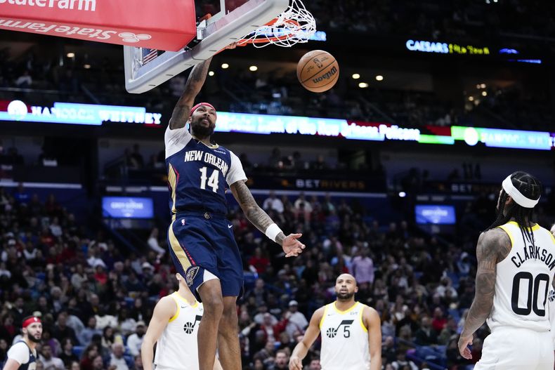 Brandon Ingram, de los Pelicans de Nueva Orleáns, realiza una volcada en el encuentro del jueves 28 de diciembre de 2023, ante el Jazz de Utah (AP Foto/Gerald Herbert)