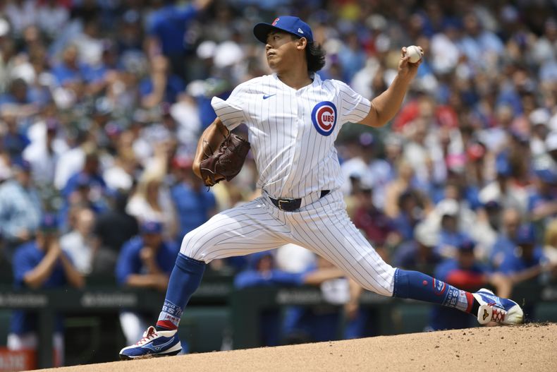 El abridor de los Cachorros de Chicago, Shota Imanaga, realiza un lanzamiento durante la primera entrada contra los Cardenales de San Luis, el sábado 15 de junio de 2024, en Chicago. (AP Foto/Paul Beaty)