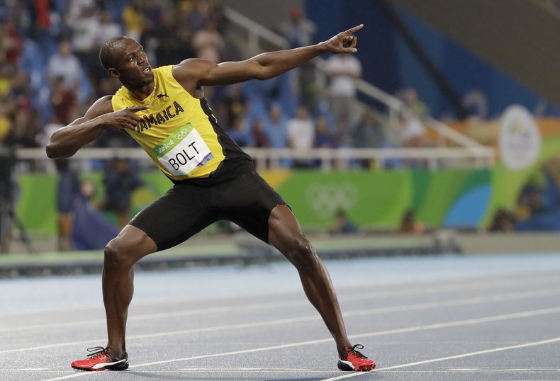 ARCHIVO - Usain Bolt celebra tras su victoria en los 200 metros de los Juegos Olímpicos de Río de Janeiro 2016, el jueves 18 de agosto de 2016. (AP Foto/David J. Phillip)