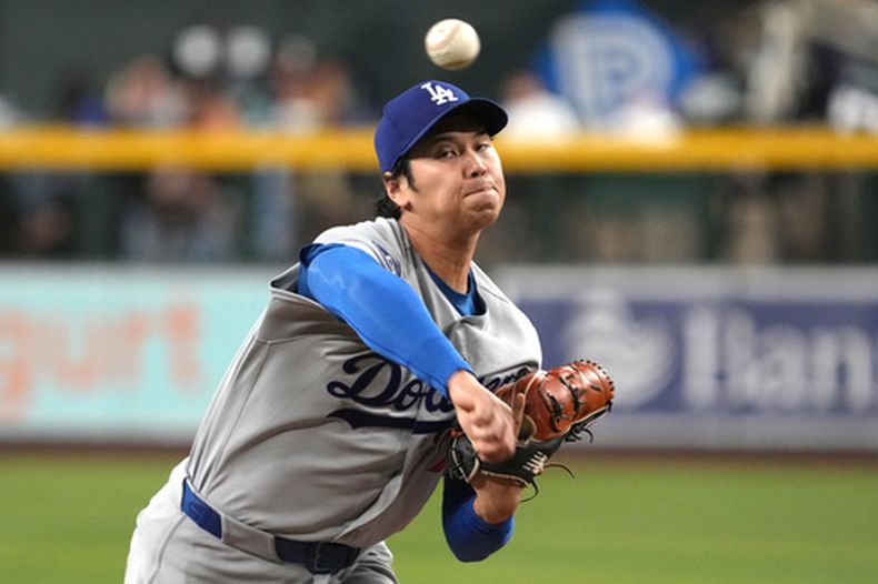 El japonés Shohei Ohtani, de los Dodgers de Los Ángeles, lanza en el juego del miércoles 3 de junio de 2026 ante los Diamondbacks de Arizona (AP Foto/Rick Scuteri)