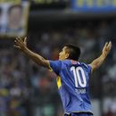ARCHIVO - Foto del 3 de abril del 2011, Juan Ramón Riquelme del Boca Juniors celebra tras anotar ante Estudiantes de La Plata. El domingo 25 de junio del 2023, a nueve años de su retiro disputa un encuentro de despedida en La Bombonera enfrentando a estrellas de la selección de distintas épocas, incluyendo Lionel Messi. (AP Foto/Eduardo Di Baia, Archivo)