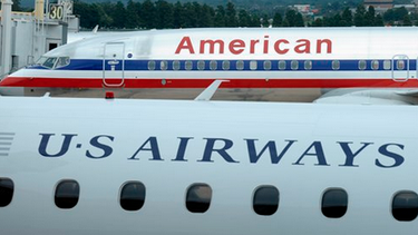 americateve | El Departamento de Justicia aprueba fusión entre American Airlines y US Airways.
