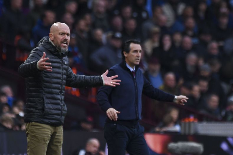 Los técnicos de Manchester United Erik ten Hag (izquierda) y Aston Villa Unai Emery durante el empate 0-0 en la Liga Premier, el domingo 6 de octubre de 2024. (AP Foto/Rui Vieira)