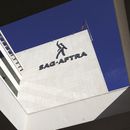 FILE - SAG-AFTRA signage is seen on the side of the headquarters in Los Angeles on Friday, Nov. 10, 2023. (AP Photo/Richard Vogel,File)
