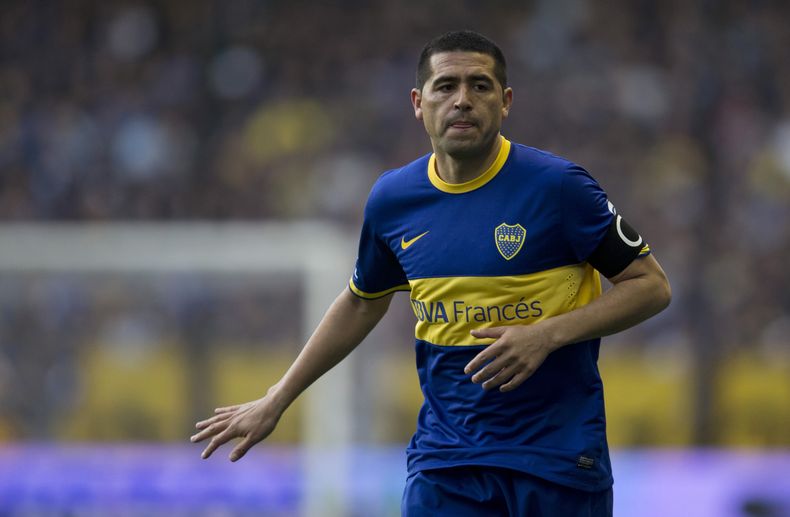 El jugador de Boca Juniors, Juan Rom&aacute;n Riquelme, gesticula en un partido contra Quilmes el domingo, 29 de septiembre de 2013, en Buenos Aires. (AP Photo/Eduardo Di Baia)
