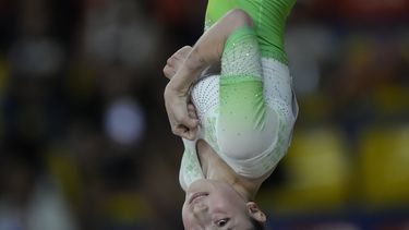 La mexicana Paulina Campos disputa la final de viga de equilibrio en los Juegos Centroamericanos y del Caribe en San Salvador, el miércoles 28 de junio de 2023 (AP foto/Arnulfo Franco)