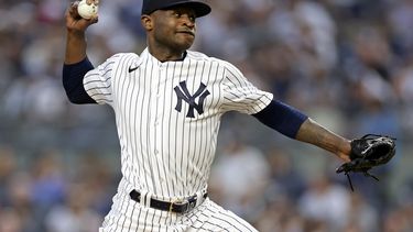 El dominicano Domingo Germán, de los Yanquis de Nueva York, hace un lanzamiento en su apertura del sábado 10 de junio de 2023, ante los Medias Rojas de Boston (AP Foto/Adam Hunger)