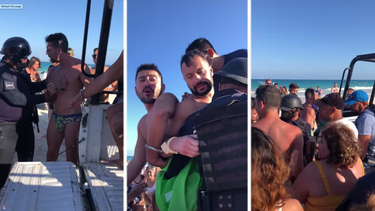 video: un grupo de personas en una playa de mexico evita que se lleven arrestada a una pareja homosexual por besarse en publico