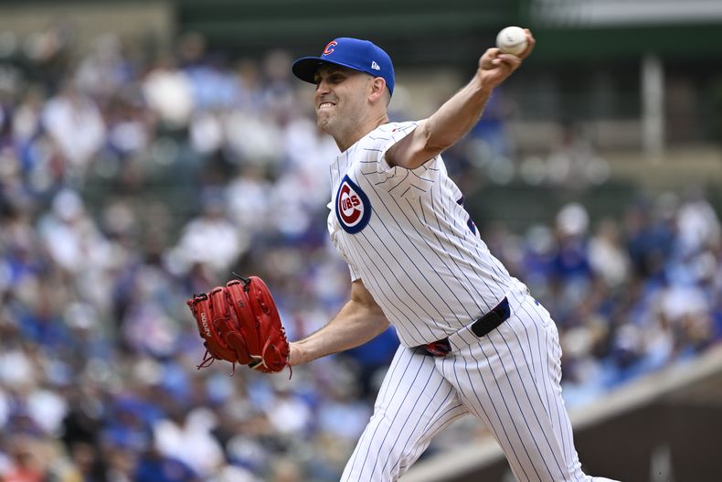El lanzador de los Cachorros de Chicago, Matthew Boyd, lanza durante la primera entrada de un juego de béisbol contra los Piratas de Pittsburgh, el sábado 14 de junio de 2025, en Chicago. (Foto AP/Matt Marton)