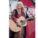 ARCHIVO - Melanie Safka abre el segundo día del festival A Day In The Garden el 15 de agosto de 1988, en Bethel, Nueva York. Melanie, la cantautora folk detrás de éxitos de la década de 1970 como Brand New Key, falleció. El publicista de Melanie le dijo a The Associated Press que ella murió el martes 23 de enero de 2024. Tenía 76 años. (Foto AP/Ken Bizzigotti, archivo)
