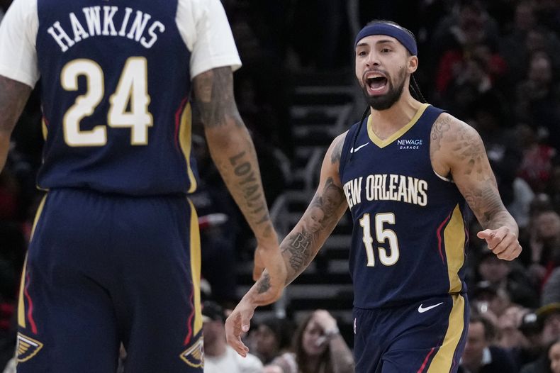 El boricua José Alvarado, de los Pelicans de Nueva Orleáns, festeja tras encestar un triple ante los Bulls de Chicago, el martes 14 de enero de 2025 (AP Foto/Nam Y. Huh)