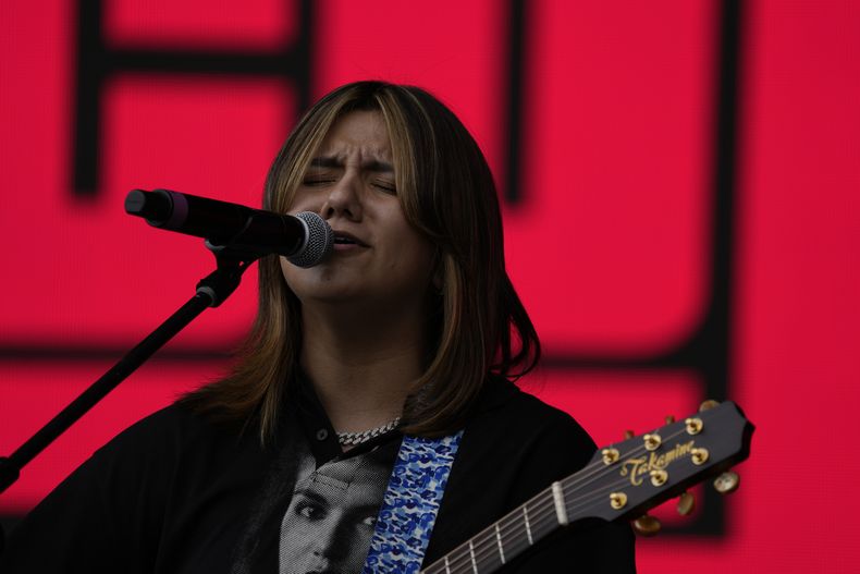 La vocalista Liz de Conexión Divina durante su concierto en el primer día del festival Arre en la Ciudad de México el sábado 9 de septiembre de 2023. (Foto AP/Fernando Llano)