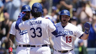 James Outman, de los Dodgers de Los Ángeles, festeja luego de conectar un grand slam ante los Mellizos de Minnesota, el miércoles 17 de mayo de 2023 (AP Foto/Ashley Landis)