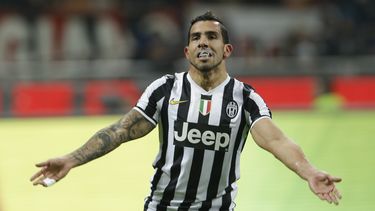 americateve | Carlos Tevez festeja el gol que anot&oacute; en la victoria 2-0 de Juventus sobre Milan el 2 de marzo del 2014 en Mil&aacute;n. El delantero dice que su convocatoria o no a la selecci&oacute;n argentina que jugar&aacute; la Copa Mundial depende del t&eacu
