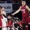 Butler anota 22; Heat vence a Bulls y llega a 50 triunfos