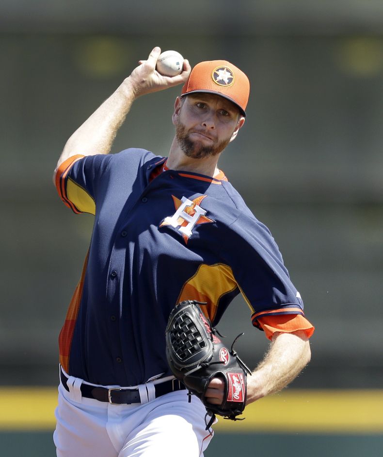 El serpentinero de los Astros Scott Feldman en acci&oacute;n contra los Nationals el 16 de marzo del 2014 en Kissimmee, Florida. Houston dijo que Feldman abrir&aacute; el juego inaugural de la temporada. (AP Photo/Carlos Osorio)