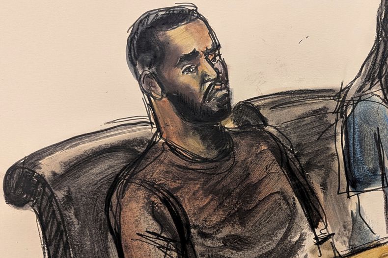 ARCHIVO - Sean Diddy Combs, sentado en la mesa de la defensa con uno de sus abogados, Teny Garagos, a la derecha, durante su audiencia de fianza, el miércoles 18 de septiembre de 2024, en Nueva York en un dibujo judicial. (Elizabeth Williams via AP, archivo)