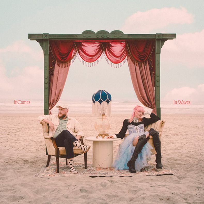 This album cover image released by Nettwerk Music Group shows It Comes in Waves by New Constellations. (Nettwerk Music Group vía AP)