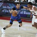 Magic derrota a Blazers, después de que ceden a McCollum