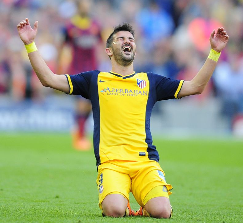 David Villa festeja la conquista de la liga espa&ntilde;ola por parte de Atl&eacute;tico de Madrid tras empatar 1-1 con Barcelona el 17 de mayo del 2014 en Barcelona. Villa firm&oacute; para jugar por tres a&ntilde;os con un nuevo equipo de la MLS estadou