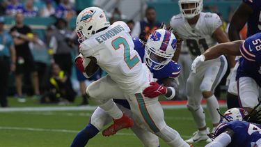 la defensa de miami sentencia a los bills y los dolphins ganan el juego mas espectacular en anos