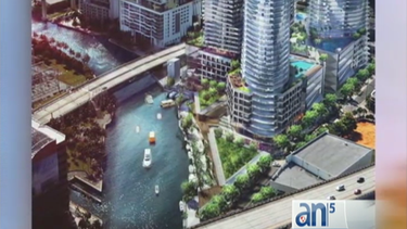 un rio miami con taxis, movilidad, vivienda asequible, restaurantes y paseo peatonal