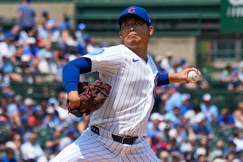 El lanzador abridor de los Cachorros de Chicago, Shota Imanaga, de Japón, lanza contra los Mellizos de Minnesota durante la primera entrada de un partido de béisbol en Chicago, el domingo 19 de julio de 2026. (Foto AP/Nam Y. Huh)