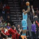 Hozier y Washington impulsan a Hornets sobre el Heat