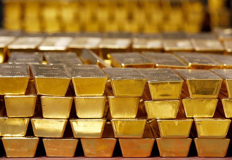 Lingotes de oro en una bóveda en la Casa de la Moneda de Estados Unidos en West Point, Nueva York, el 22 de julio del 2014. (AP foto/Mike Groll)